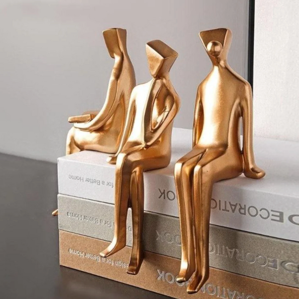 Embrace Timeless Elegance: The Abstract Golden Human Sitting Art Sculpture