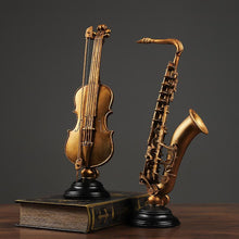 Load image into Gallery viewer, Vintage Violin &amp; Saxophone Statue
