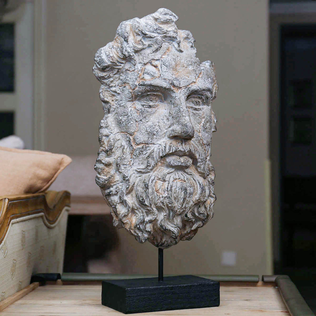 Ancient Face Sculpture